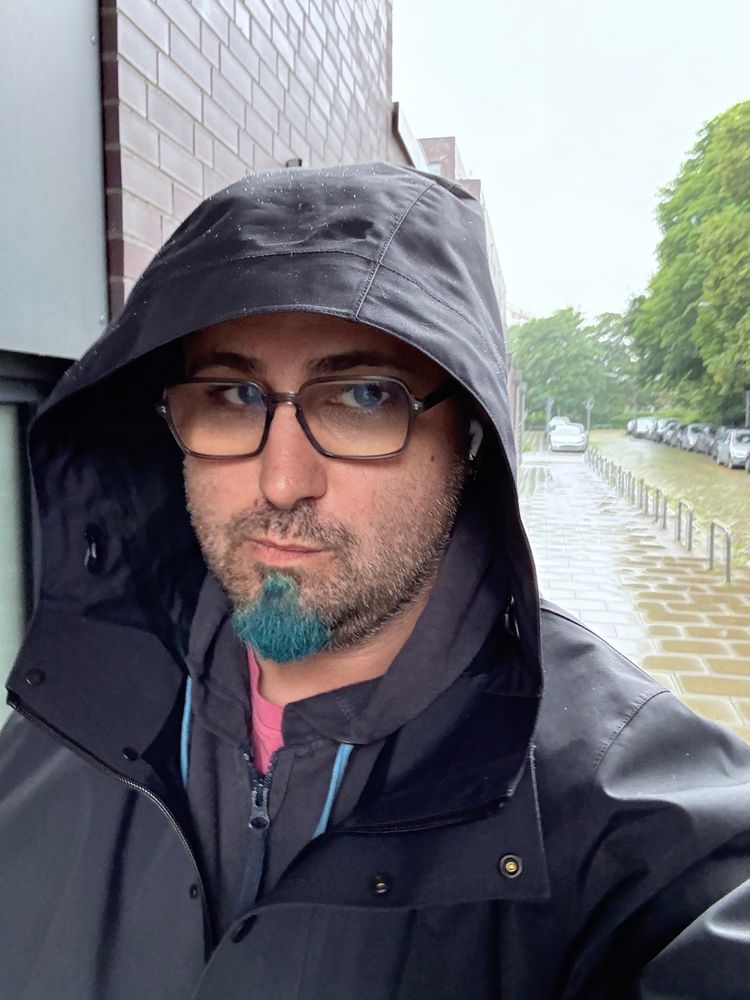 Selfie with a large raincoat 