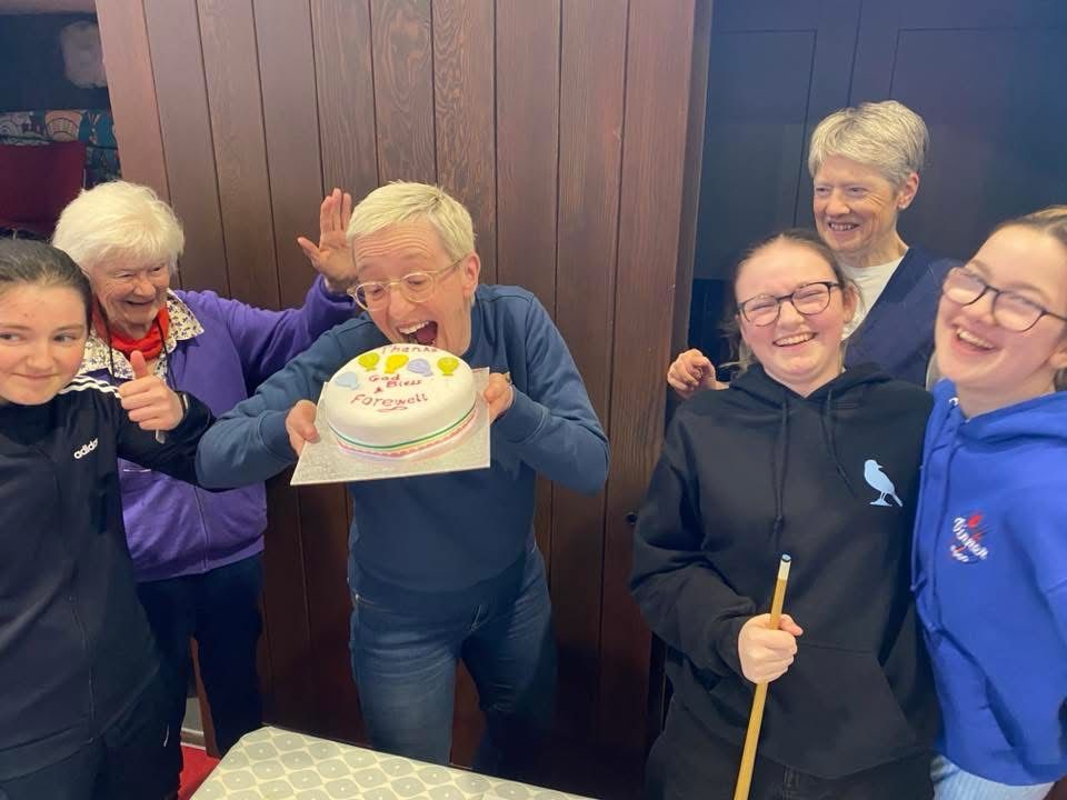 Pausingplace (trying to eat a whole cake) and some smiley teenagers.  