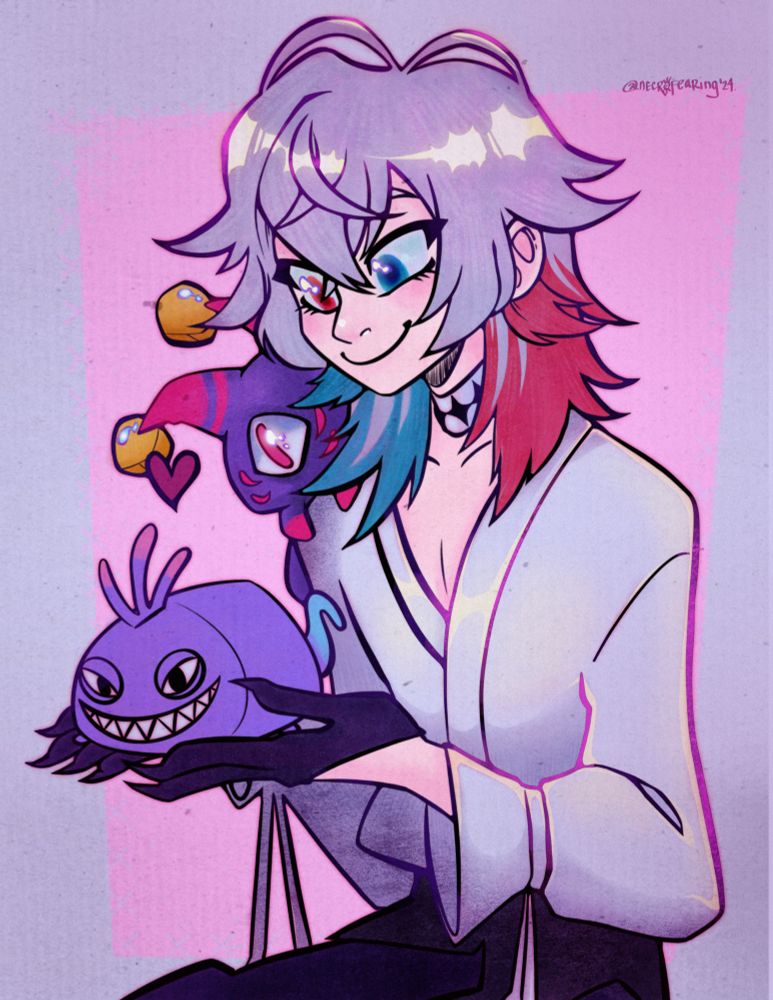 gavis bettel holding a randall tsum tsum. phantom is in his shoulder and both of them are looking at the plushie.