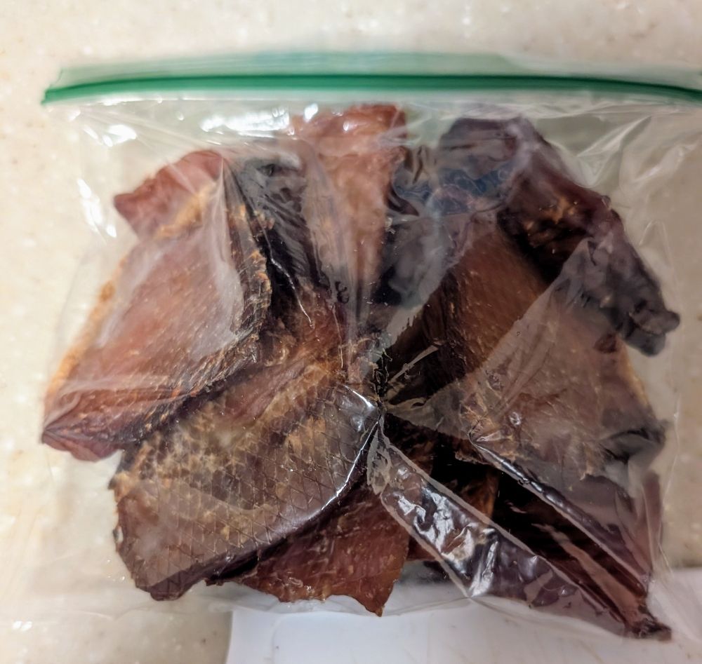 The plastic bag filled with pork tenderloin fillets