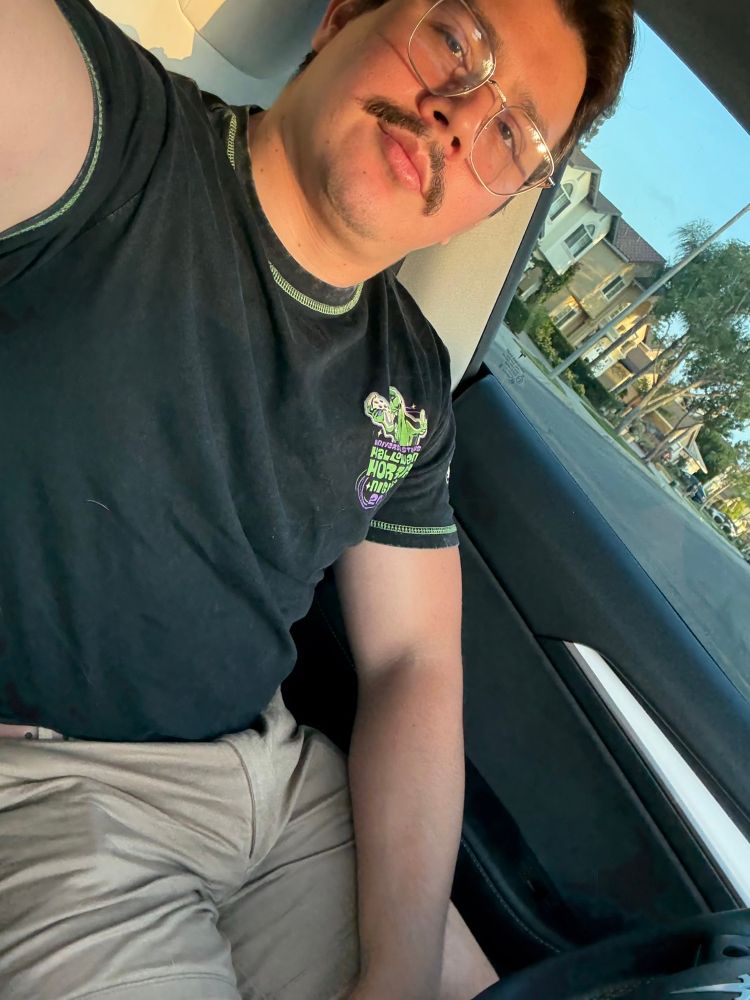 Lil boy, being blinded by the sun 