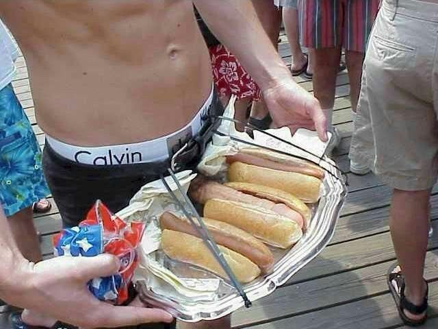 A man’s dick in a hot dog bun