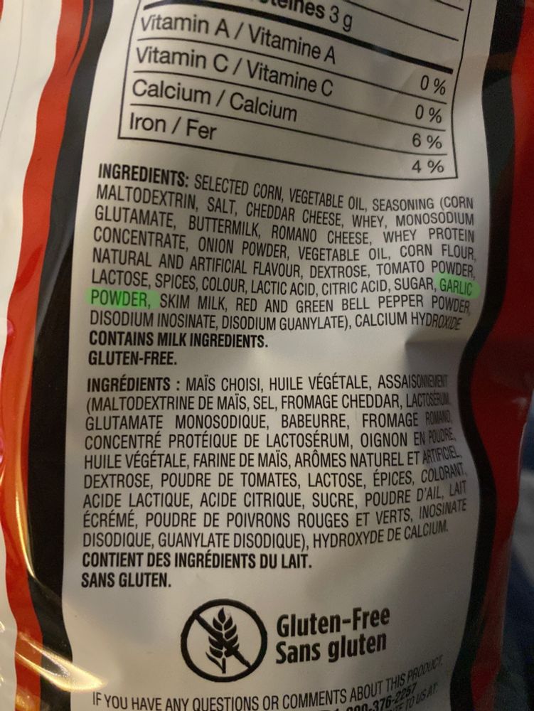 The back of a bag of Nacho Cheese Doritos, showing the ingredients list. "GARLIC POWDER" is highlighted.