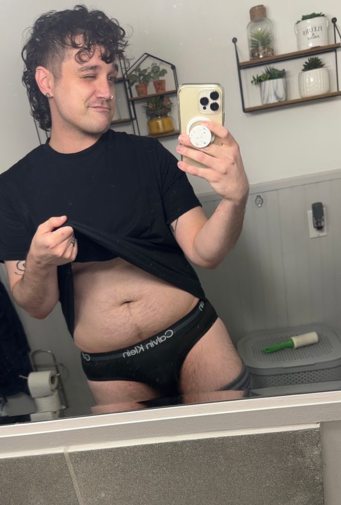 gay being gay in front of a mirror with his belly out because nothing comes between me and my calvins ‘cept maybe ma diyuck idk ty for reading