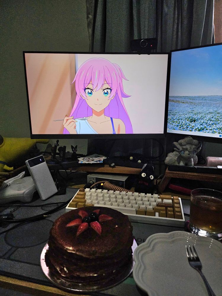Eating cake on a desk with Akari to celebrate her birthday