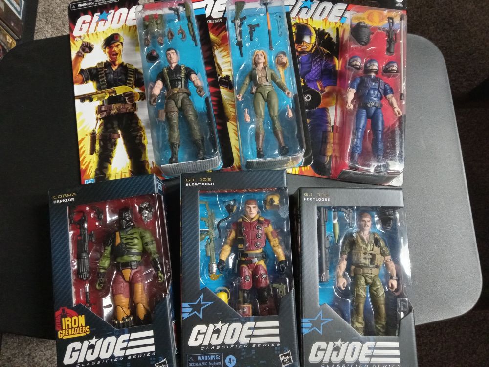 some new gi joe classified figures still in their packages:  flint, cover girl, televiper, darklon, blowtorch, and footloose