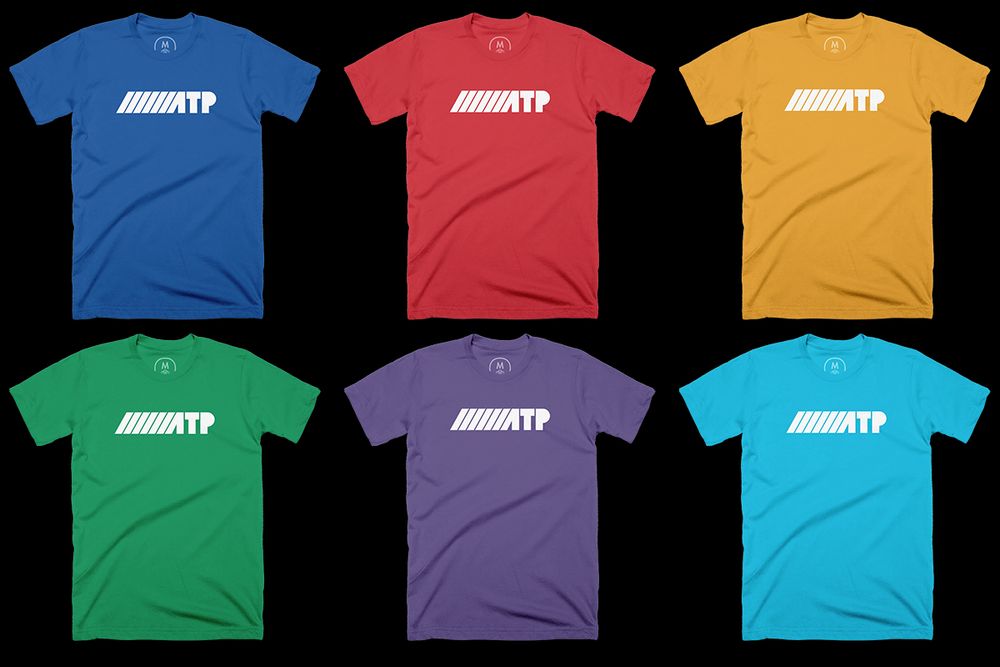 Six different colors of t-shirts with a white ATP logo on them: blue, red, gold, green, purple, and teal.