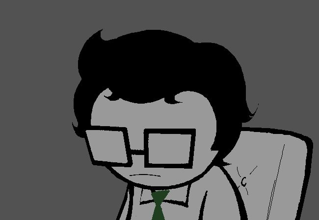 A bespectacled boy look down at the floor despondantly. His eyes are obscured. He is sitting in a chair.