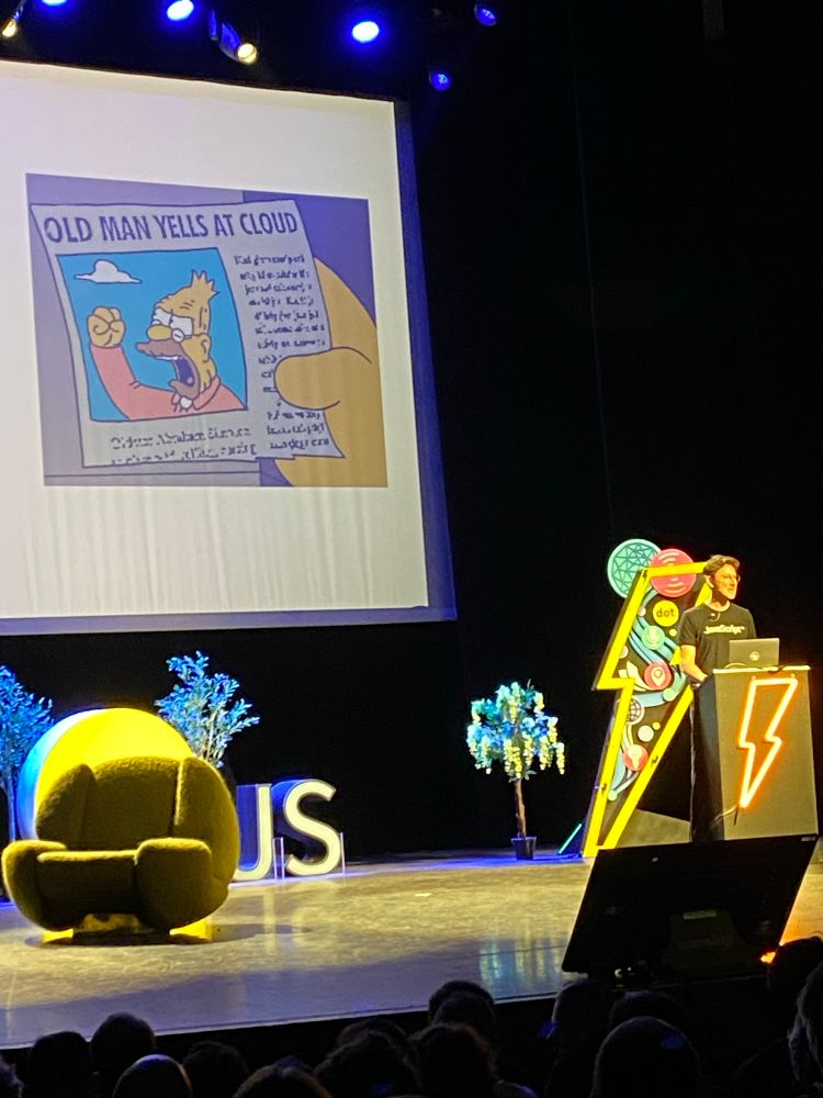 Ryan Dahl on stage of DotJS livecoding