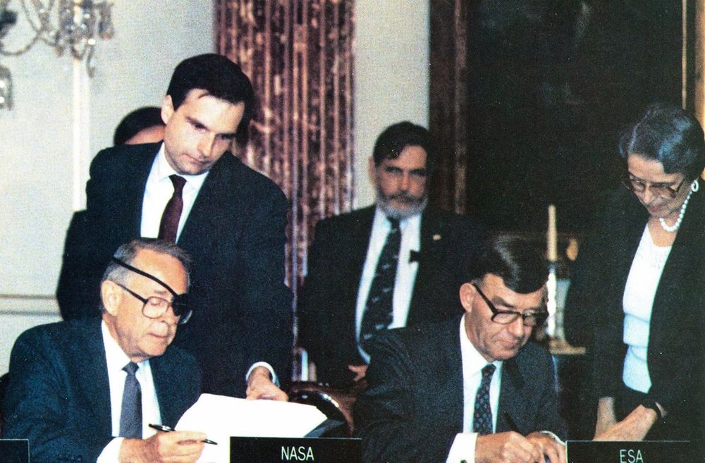In this photograph NASA Deputy Administrator Dale Myers (on the left) and ESA Director General Reimar Lüst sign the Memorandum of Understanding for Space Station Freedom in Washington DC. 