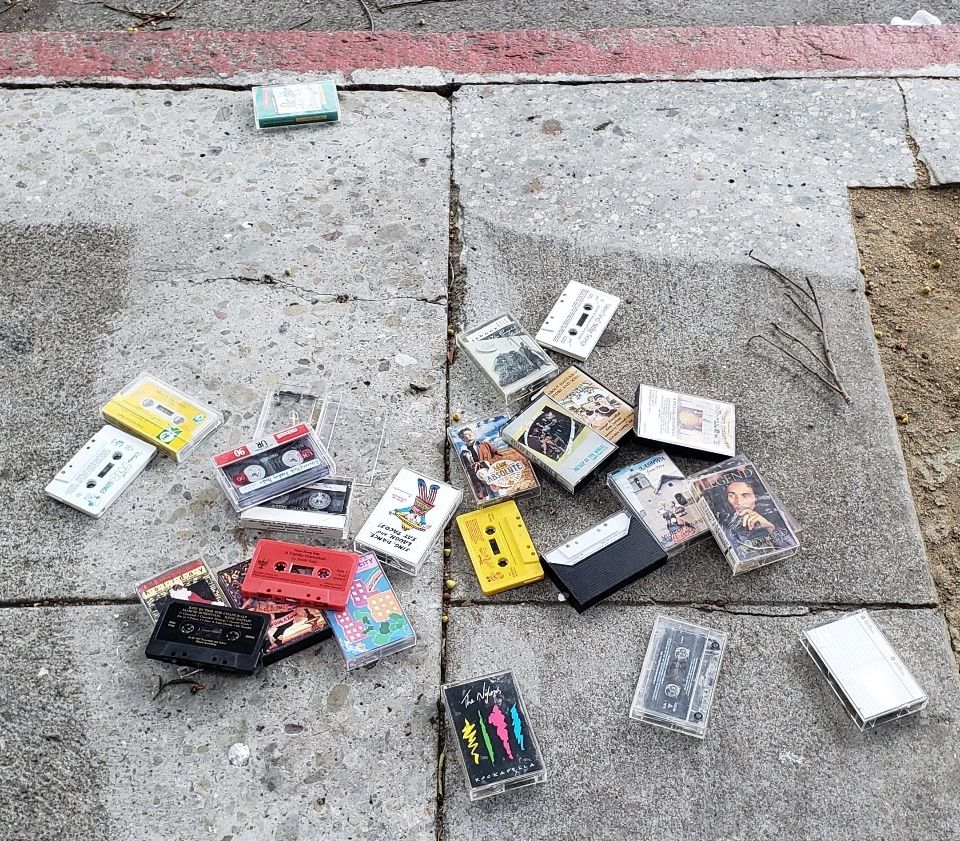 Cassette tapes abandoned on a sidewalk in San Francisco, CA