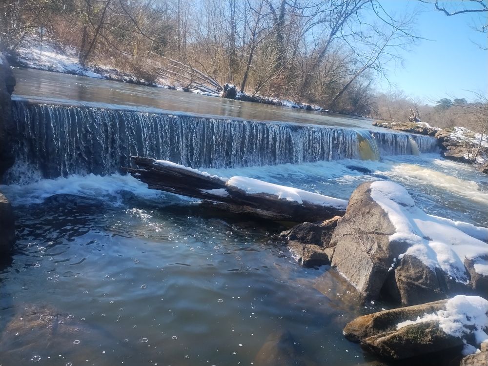 Waterfall cascading over Battersea Dam.  Petersburg has Water, breakfast at Buttery Baking House. Along the Appomattox - See FOLAR for MLK Day of Service. In the 19th century Pocohantas Island  became a Freedom Colony, First predominately free black settlement in Virginia. By 1860, one of the largest in the nation. #mlkday #rva #water