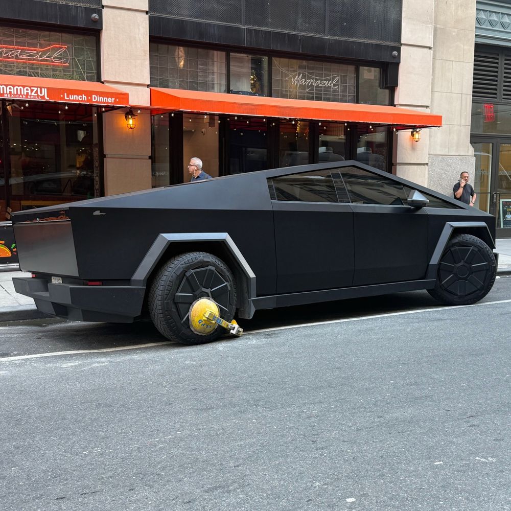 a cybertruck with a boot, baby