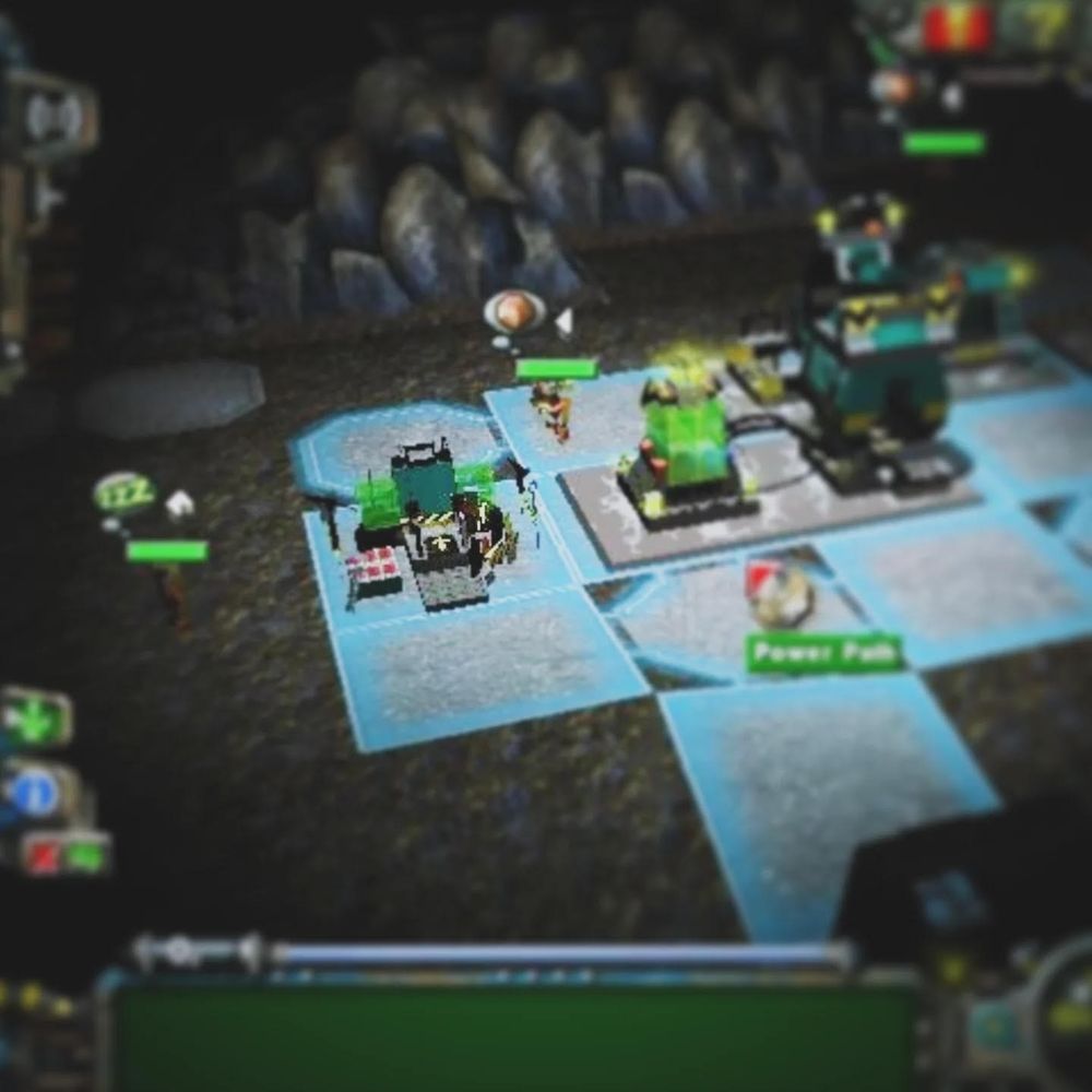 Luminescent machinery is structured together in a dark cavern for a LEGO mining operation.