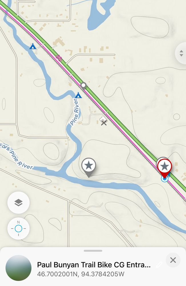 Screenshot from the Mapy navigation app with a red pin marking the entrance to the Paul Bunyan Trail Bike CG (which is a mistake and should say “Pine River Bike Campground” and the exact coordinates of that location at 46.7002001N, 94.3784205W