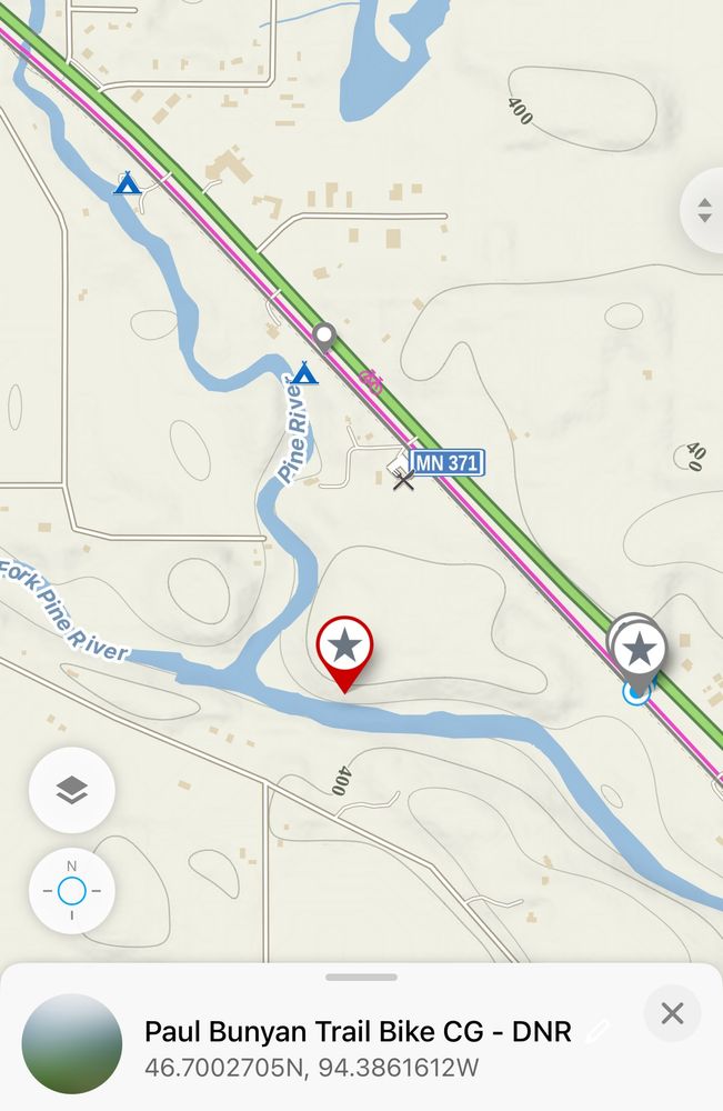 Screenshot from the Mapy navigation app showing the exact location of the Pine River Bike Campground (the image incorrectly says Paul Bunyan Trail Bike CG), about 650m from the entrance and along the bank of the Pine River. The exact coordinates are 46.7002705N, 94.3861612W