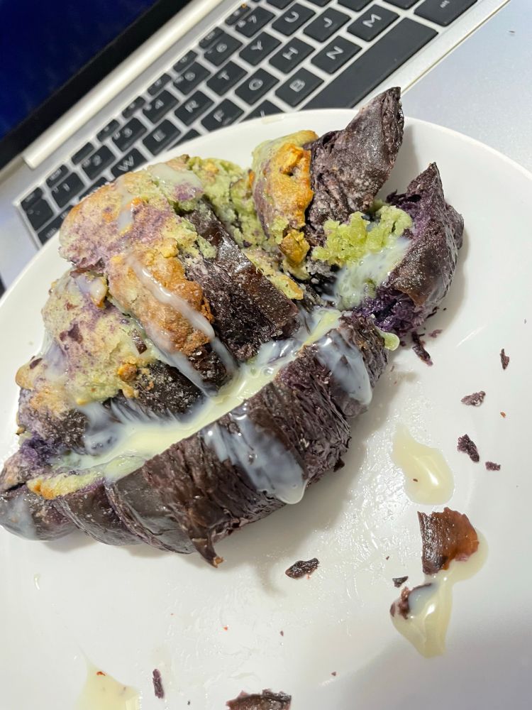 Ube pistachio breakfast croissant on plate 