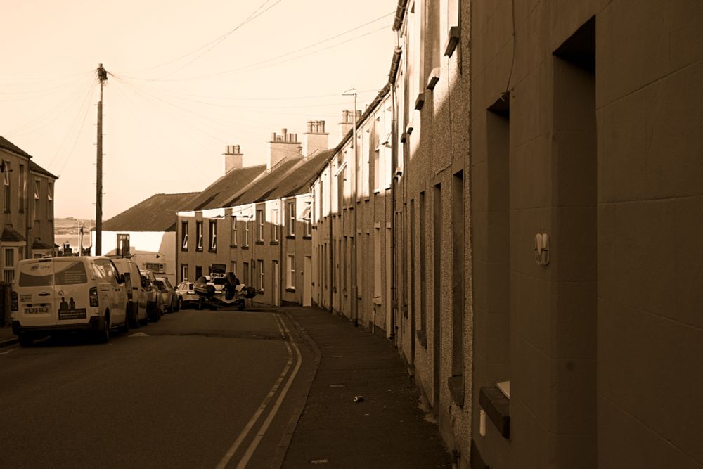 monochrome shot of an empty street in the town of Holy Head on Anglesey, Wales