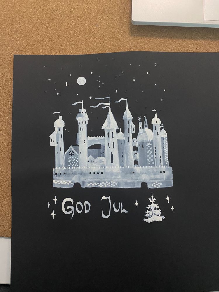 the same castle but now with stars in the sky and "God Jul" under.