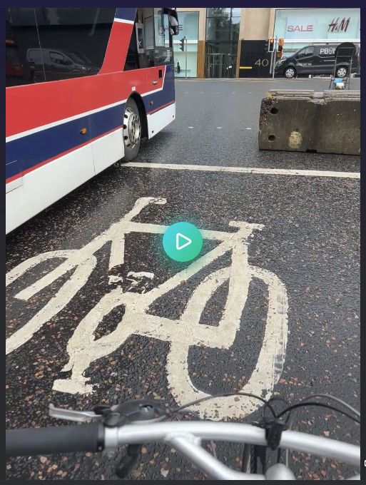 video clip showing airport bus encroached in bikebox (the bus is stopped) and leaving just a narrow gap for bikes