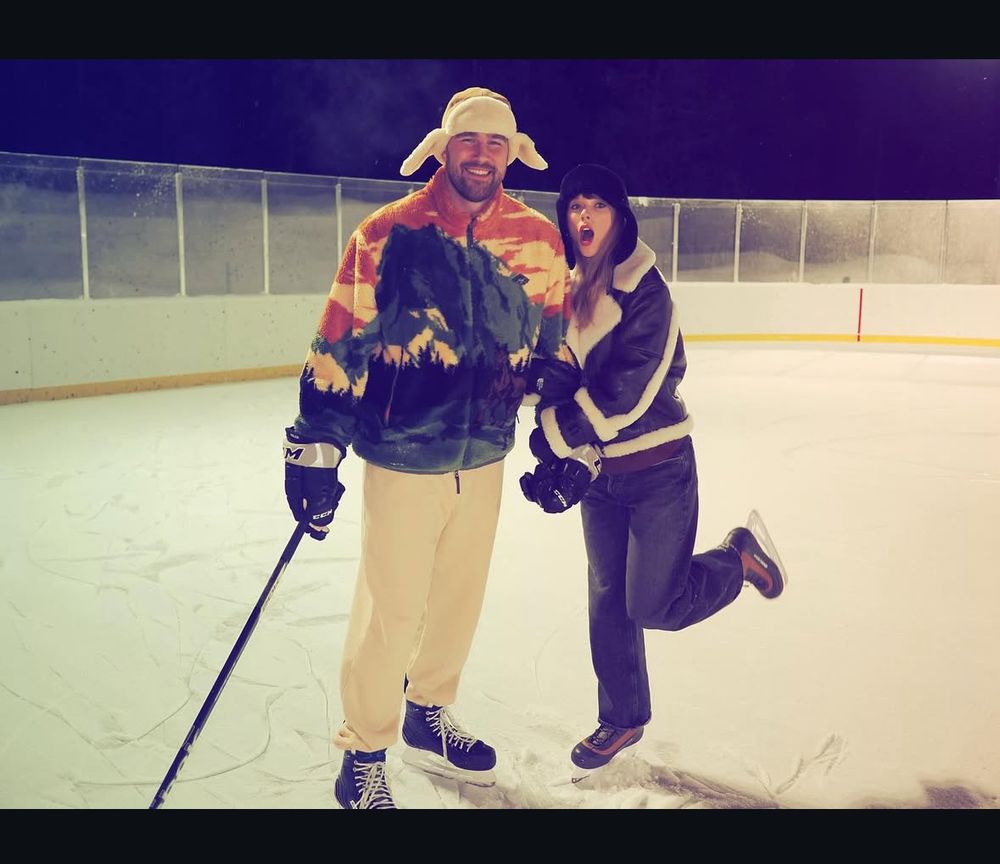 Travis and Taylor are ice skating 