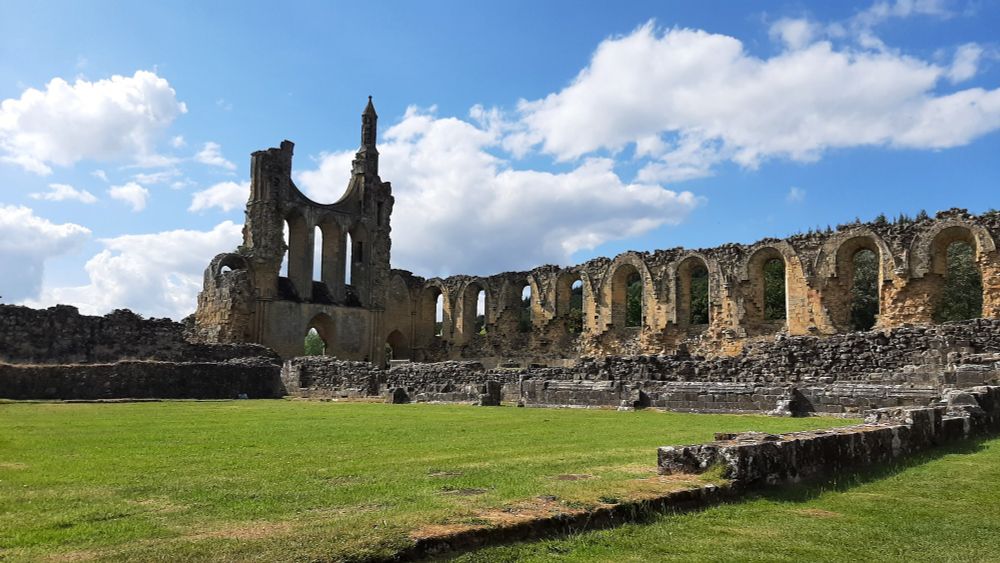 Same main ruined abbey, but with blue skies and some small cumulus clouds.