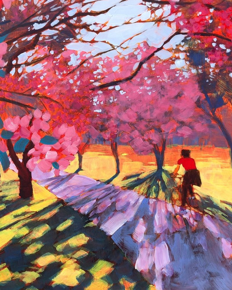 A colorful acrylic painting by Jim Musil depicting a woman riding her bike through blossoming pink trees. The grass is a bright yellow green for Spring.