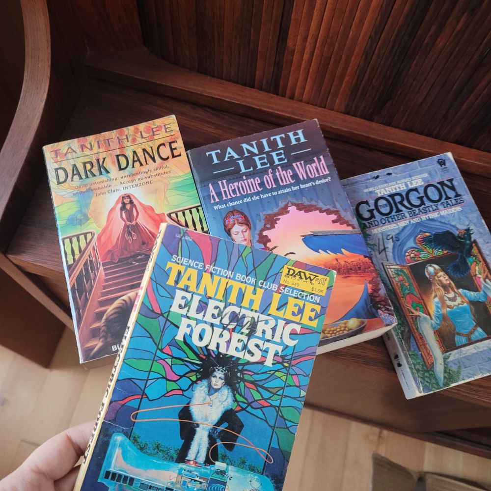 Picture with several Tanith Lee book covers.