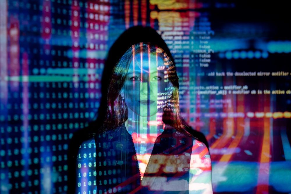 Woman with computer data overlay