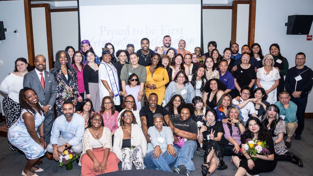 First generation NYU Silver graduates pose with loved ones and school leaders.