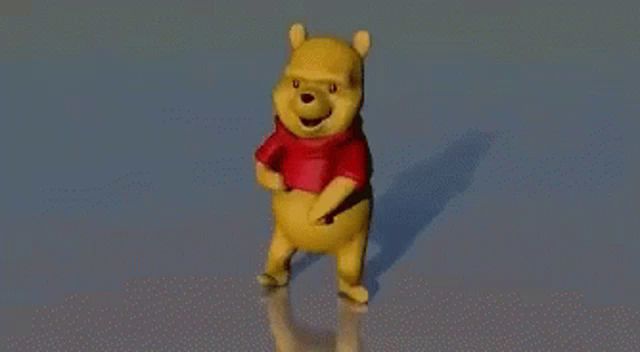 winnie the pooh is wearing a red shirt and dancing on a blue surface .