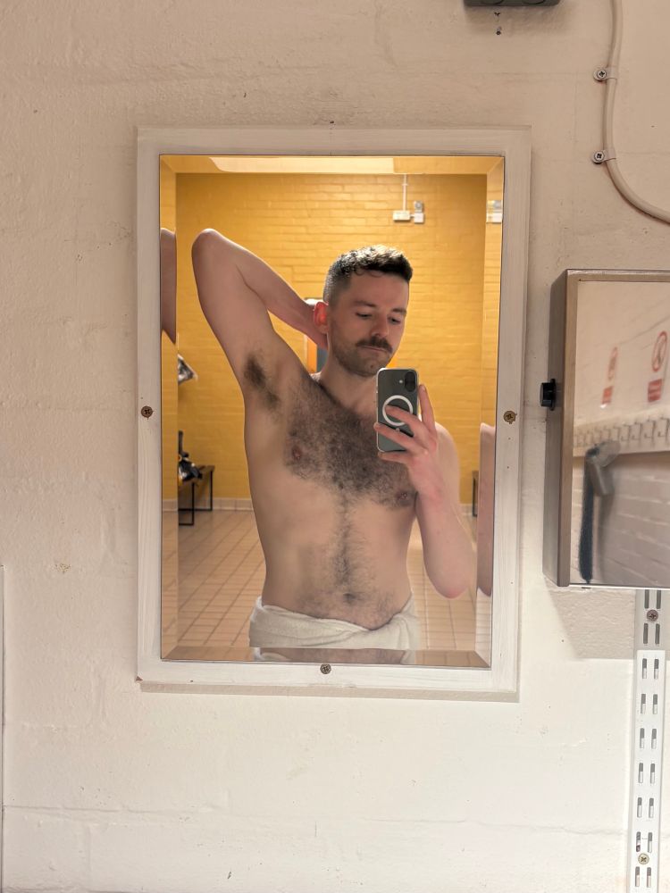 Selfie of Patrick in the gym changing room. 