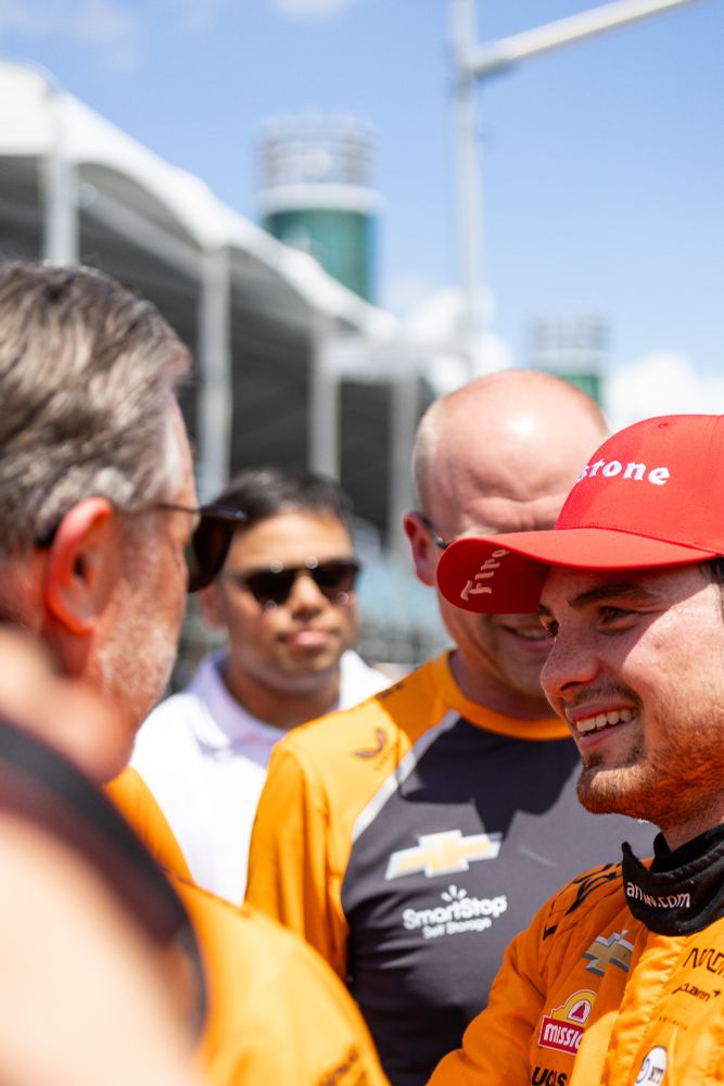 Pato O'Ward is congratulated by Zak Brown on his victory. 