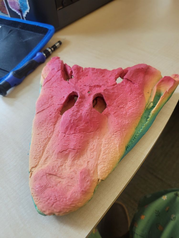 A 3D print of a fossil that appears to be a particularly triangular croc skull