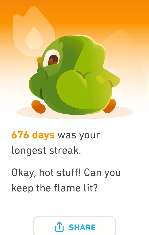Duo the Duolingo owls body facing away but the owl is looking at you over his shoulder. His butt cheeks are prominent. The text reads, "676 days was your longest streak. Okay, hot stuff. Can you keep the flame lit?"