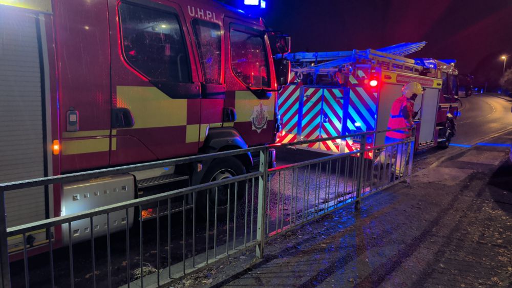 Some fire engines who have come to put out a fire ON MY TRAIN