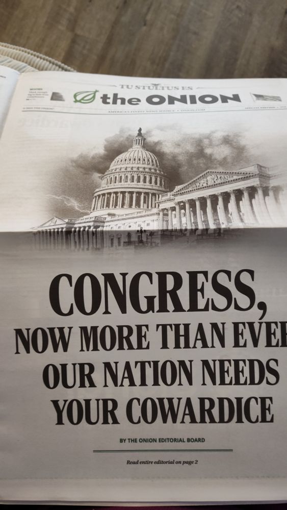 Full page center spread in The Onion with a black and white picture of the White House. Big bold black letters read:

CONGRESS, 
NOW MORE THAN EVER OUR NATION NEEDS YOUR COWARDICE