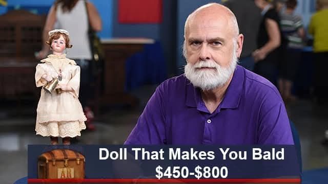 Bald man with a doll. Caption: doll that makes you bald