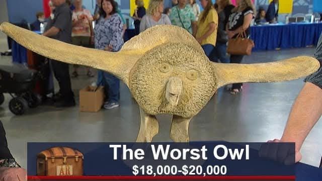 Some kind of carved owl statue. Caption: the worst owl $18,000-$20,000