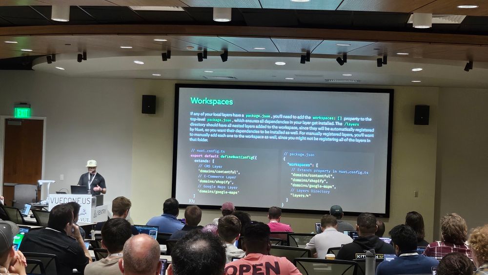 Dino Mastrianni teaching the audience about Nuxt Layers