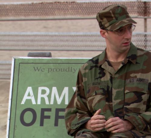 buster bluth on a bench that says "arm off"