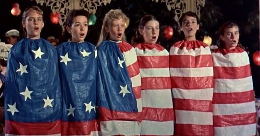 A still image of children dressed as a 1700s American flag from the movie Pollyanna