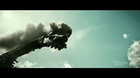 Cinematic clip of an old fashioned steam train, with thick black smoke billowing from its engine's smoke stack, careening off a bridge into a chasm. View from below, looking upward at an angle toward the front of the falling train.
