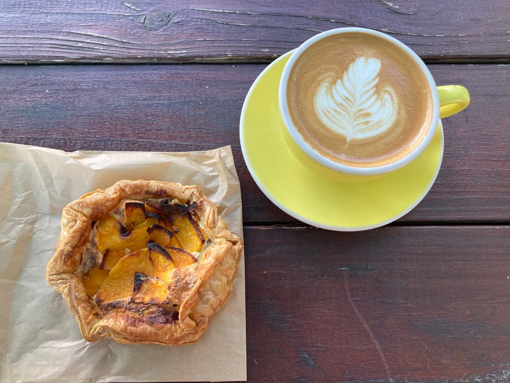 Oat milk cappuccino and a squash and ricotta galette 