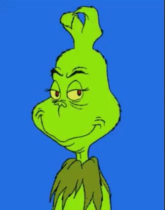 the grinch is a cartoon character with a very angry face and red eyes .