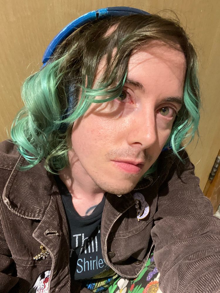 An unusually large and tight (for my normally wavy hair) ringlet curl that formed on one side of my head