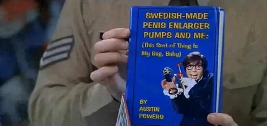 Still from Austin Powers where his claim to having no idea how a penis pump got in with his personal effects is undone by a copy of a book he wrote praising it