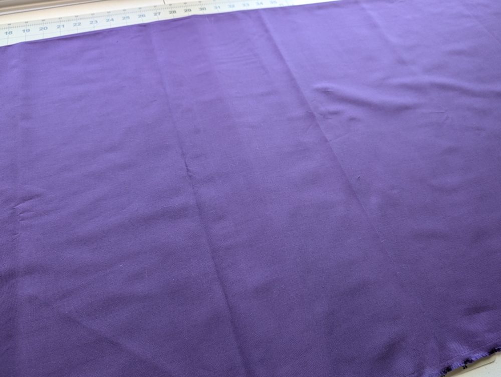 Solid purple uncut fabric 