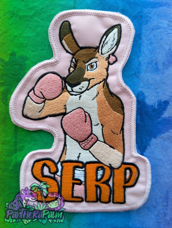 Embroidered artwork of kangaroo with pink boxing gloves