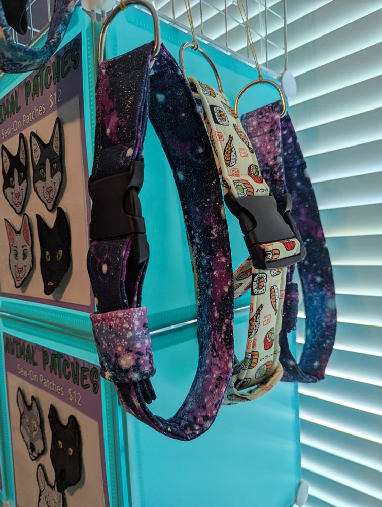 Fursuit collars in galaxy and sushi designs 